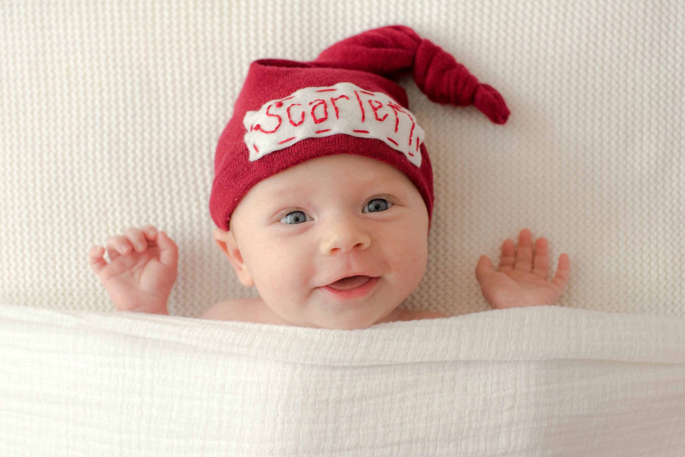 Studio portrait of a young baby named Scarlett